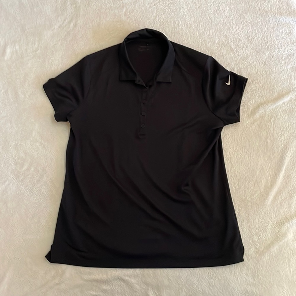 Black NikeGolf shirt, excellent condition, size XL, but runs small to me.